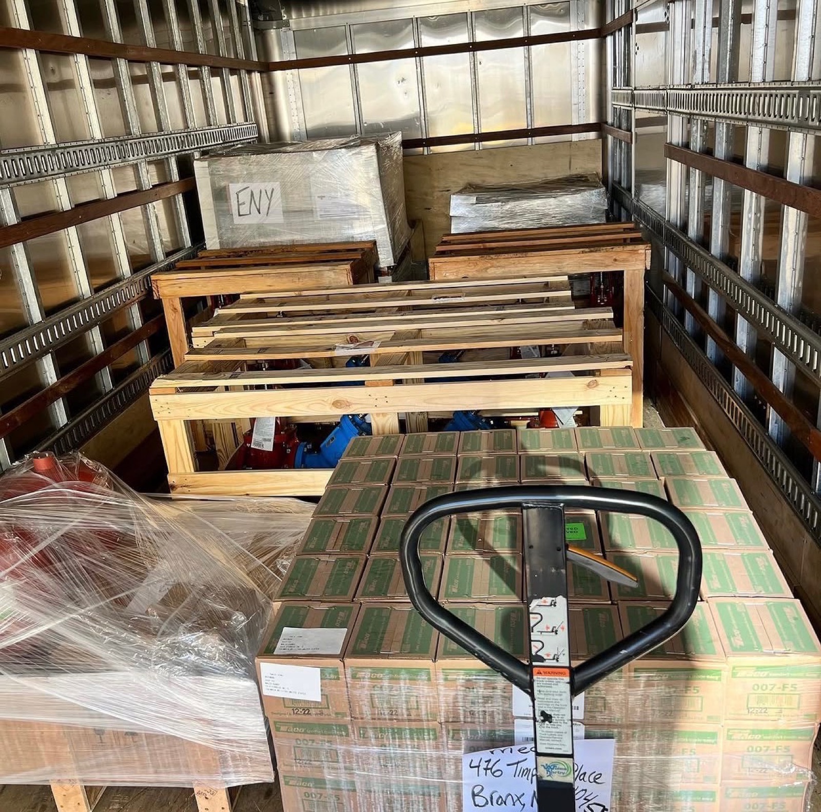 Interior of a loaded box truck with palletized freight bound for the Bronx
